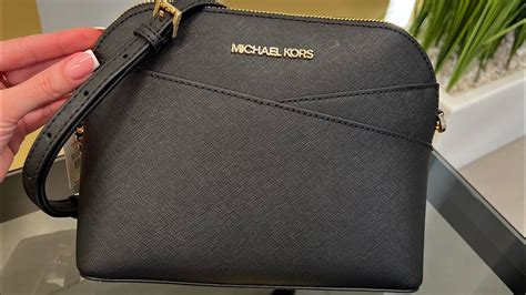 michael kors medium dome crossbody|More.